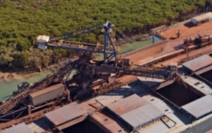 Photograph of the existing slewing-luffing shiploader on Stanley Point Berths 1 & 2.